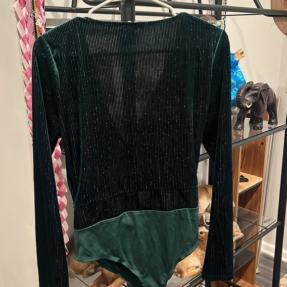 Large dark green body suit from sage.There is a cross knot in the middle part - Picture 2 of 2